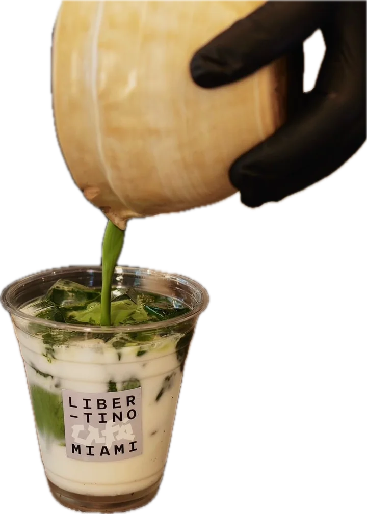 Matcha being poured into a Libertino cup over ube